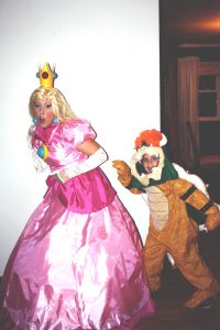 Me dressed as Princess Peach and my son dressed as Bowser